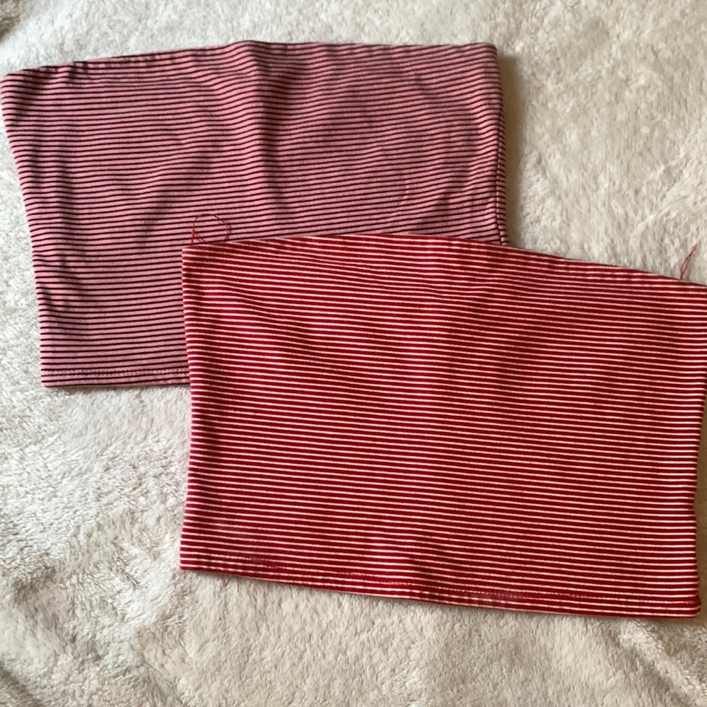 Tube tops. Red and white stripe and pink and black. 2 for 20 or 12 each!
